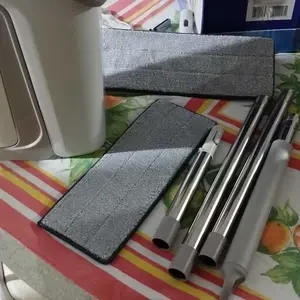 Foto de cliente: kit de mop com os panos e as partes do cabo sobre a mesa